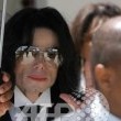 Michael Jackson arrives at the Santa Barbara County courthouse.