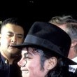 Michael Jackson attends the opening of Donald Trump's Taj Mahal Casino.