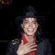 Michael Jackson attends the opening of Donald Trump's Taj Mahal Casino.