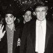 Michael Jackson attends the opening of Donald Trump's Taj Mahal Casino.