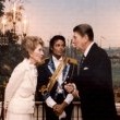 Michael meets with former president Ronald Reagan and his wife Nancy at the White House.