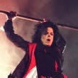 Michael performs 'Earth Song' at the Brit Awards.