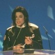 Michael performs 'Earth Song' at the Brit Awards.
