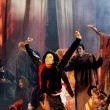 Michael performs 'Earth Song' at the Brit Awards.
