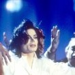 Michael performs 'Earth Song' at the Brit Awards.