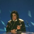 Michael performs 'Earth Song' at the Brit Awards.