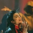 Michael performs 'Earth Song' at the Brit Awards.