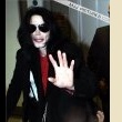 Michael poses with his seven Guinness world records awards.