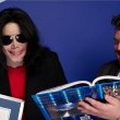 Michael poses with his seven Guinness world records awards.