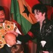 Michael receives an award from the "Thats What Friends Are For" Committee.