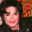 Michael receives an award from the "Thats What Friends Are For" Committee.