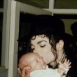 Michael stops and visits children at an Romanian orphanage in 1992 during his 'Dangerous' tour.