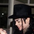 Michael stops and visits children at an Romanian orphanage in 1992 during his 'Dangerous' tour.