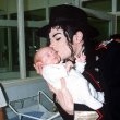 Michael stops and visits children at an Romanian orphanage in 1992 during his 'Dangerous' tour.