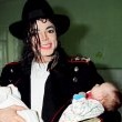Michael stops and visits children at an Romanian orphanage in 1992 during his 'Dangerous' tour.
