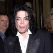 Michael visits England accompanied by Uri Geller and magician David Blaine.