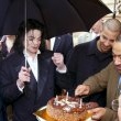 Michael visits England accompanied by Uri Geller and magician David Blaine.
