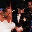 Michael visits Nelson Mandela to celebrate his 80th birthday.
