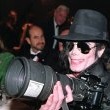 Michael visits Nelson Mandela to celebrate his 80th birthday.