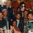 Michael visits South Africa visiting with his friend Nelson Mandela and celebrating his 78th birthday.