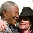 Michael visits South Africa visiting with his friend Nelson Mandela and celebrating his 78th birthday.