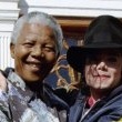 Michael visits South Africa visiting with his friend Nelson Mandela and celebrating his 78th birthday.