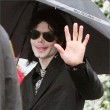 Michael with his 2 children, Prince and Paris, are seen outside a studio