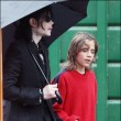 Michael with his 2 children, Prince and Paris, are seen outside a studio