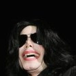 World Music Awards. Michael walks the red carpet and signs his autograph for fans as he enters the ceremony.