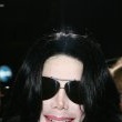 World Music Awards. Michael walks the red carpet and signs his autograph for fans as he enters the ceremony.