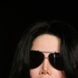 World Music Awards. Michael walks the red carpet and signs his autograph for fans as he enters the ceremony.