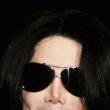 World Music Awards. Michael walks the red carpet and signs his autograph for fans as he enters the ceremony.